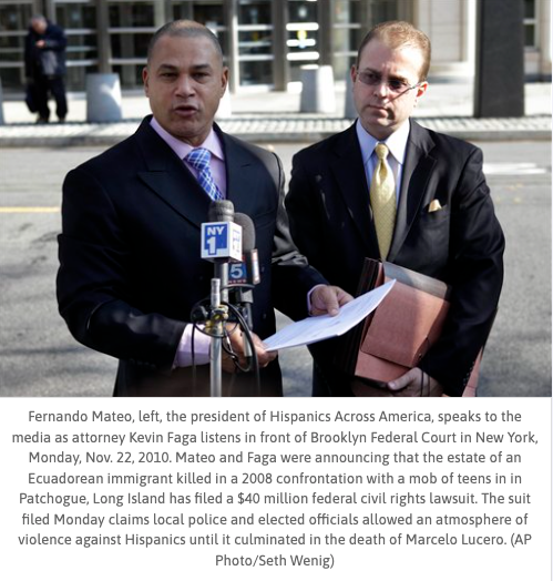 Two men are standing next to each other in front of a microphone