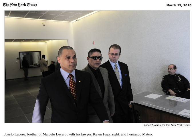 A group of men in suits and ties are walking in a hallway