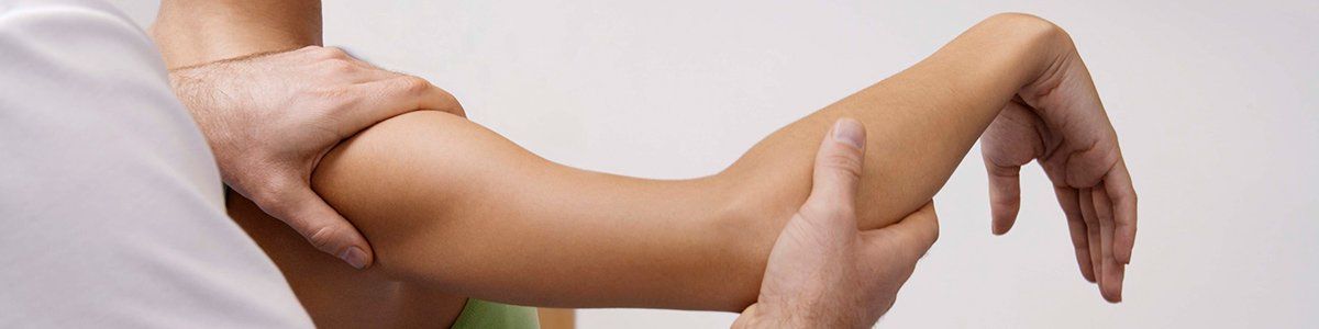 Osteopathic treatment on the arm in New Town