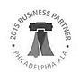 2015 Business Partner logo with Liberty Bell and circular text 