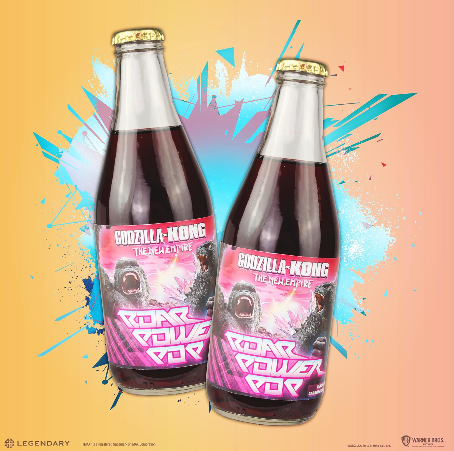 Two bottles of godzilla a kong soda are sitting next to each other on a table.