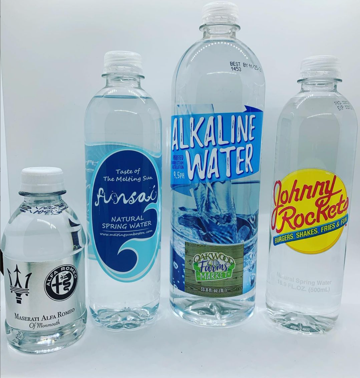 A bottle of johnny rockets sits next to a bottle of alkaline water