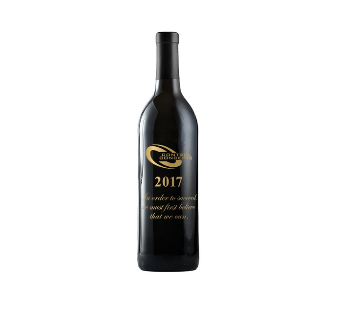 A bottle of wine with the year 2017 engraved on it.