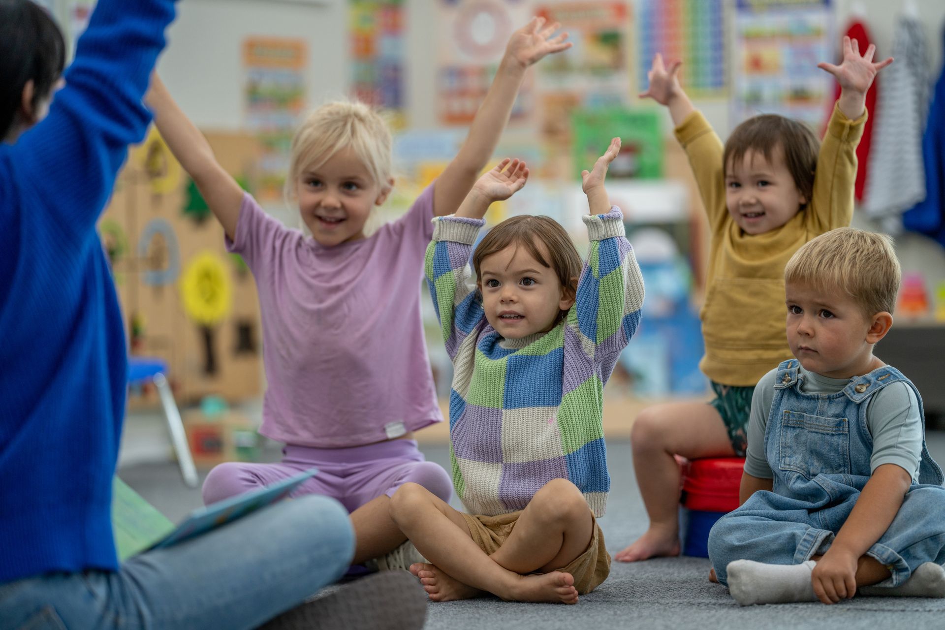 Group of children doing a sing-along. Group of children doing a sing-along.