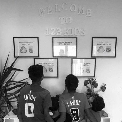 Children interacting in the welcoming lobby of 123KIDS Early Learning Centre.