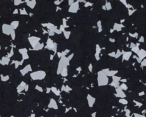 Dark floor with white and gray speckles.