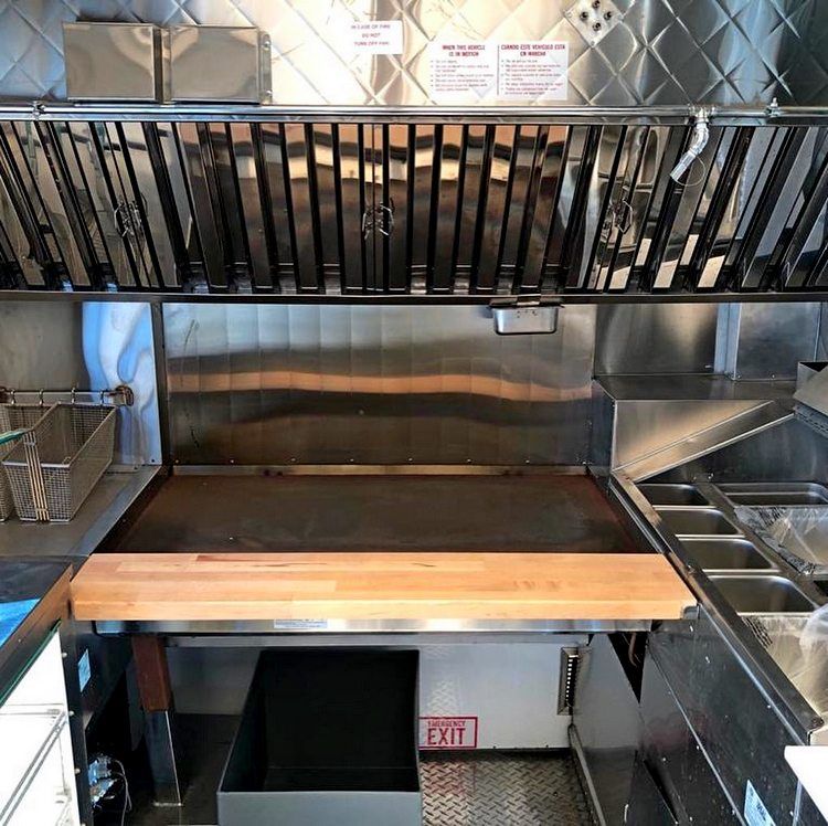 A stainless steel kitchen equipment for a food truck