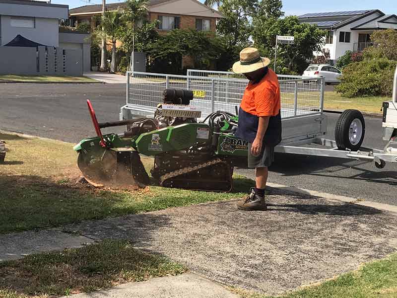A Stump Grinder removing a tree stump in Lismore