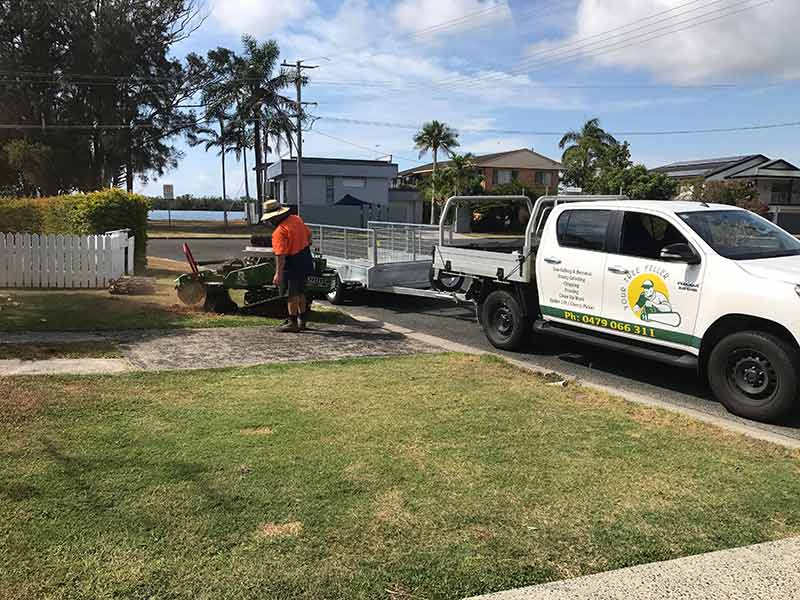 A Stump Grinder being used in a front yard in Lismore
