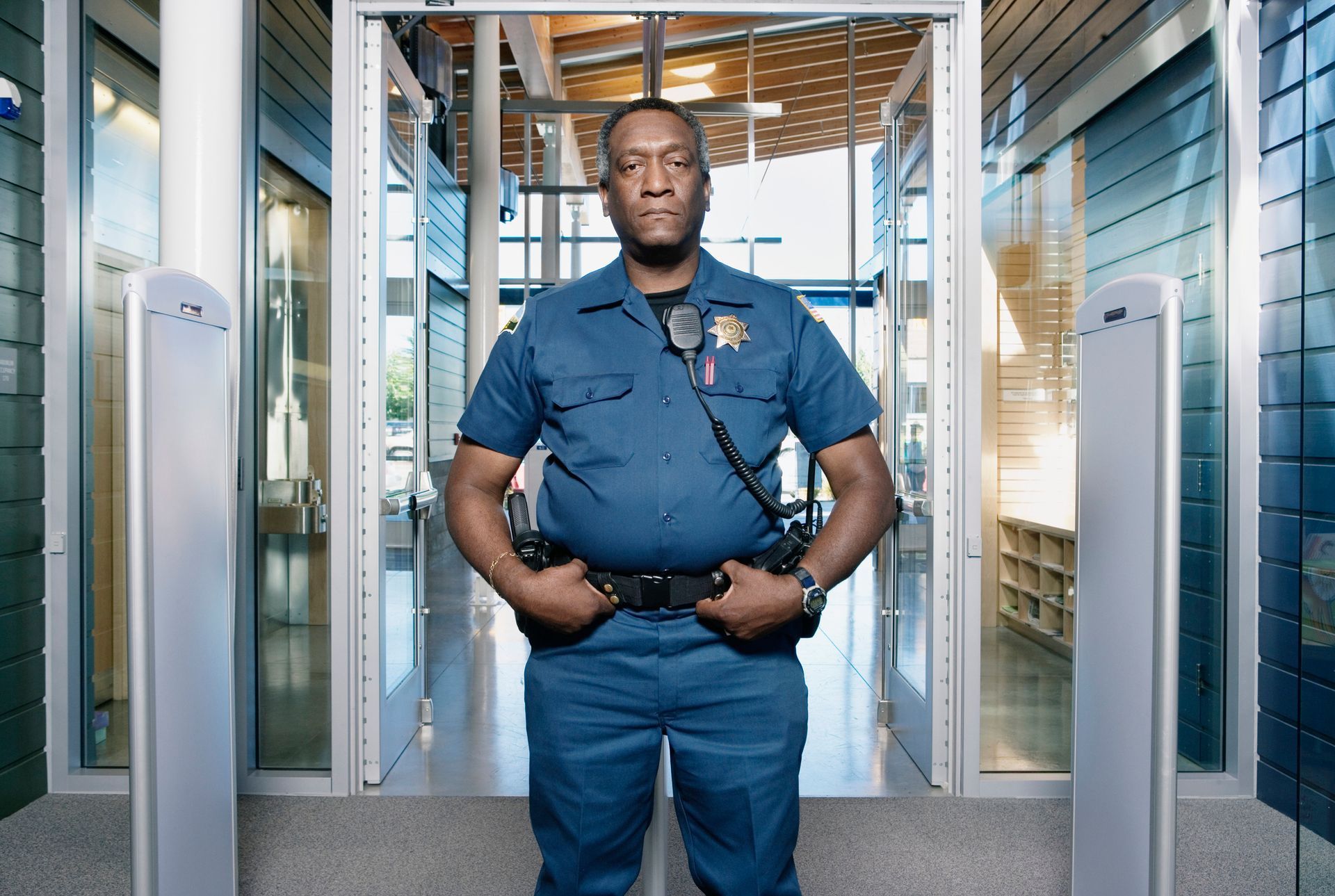 A security guard is posing.