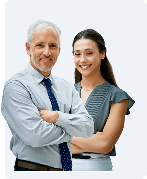 A man and a woman are posing for a picture with their arms crossed.