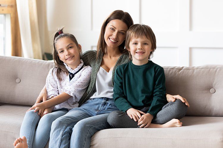 Woman With Her Children — Onalaska, WI — Ann I. Brandau Law Office LLC