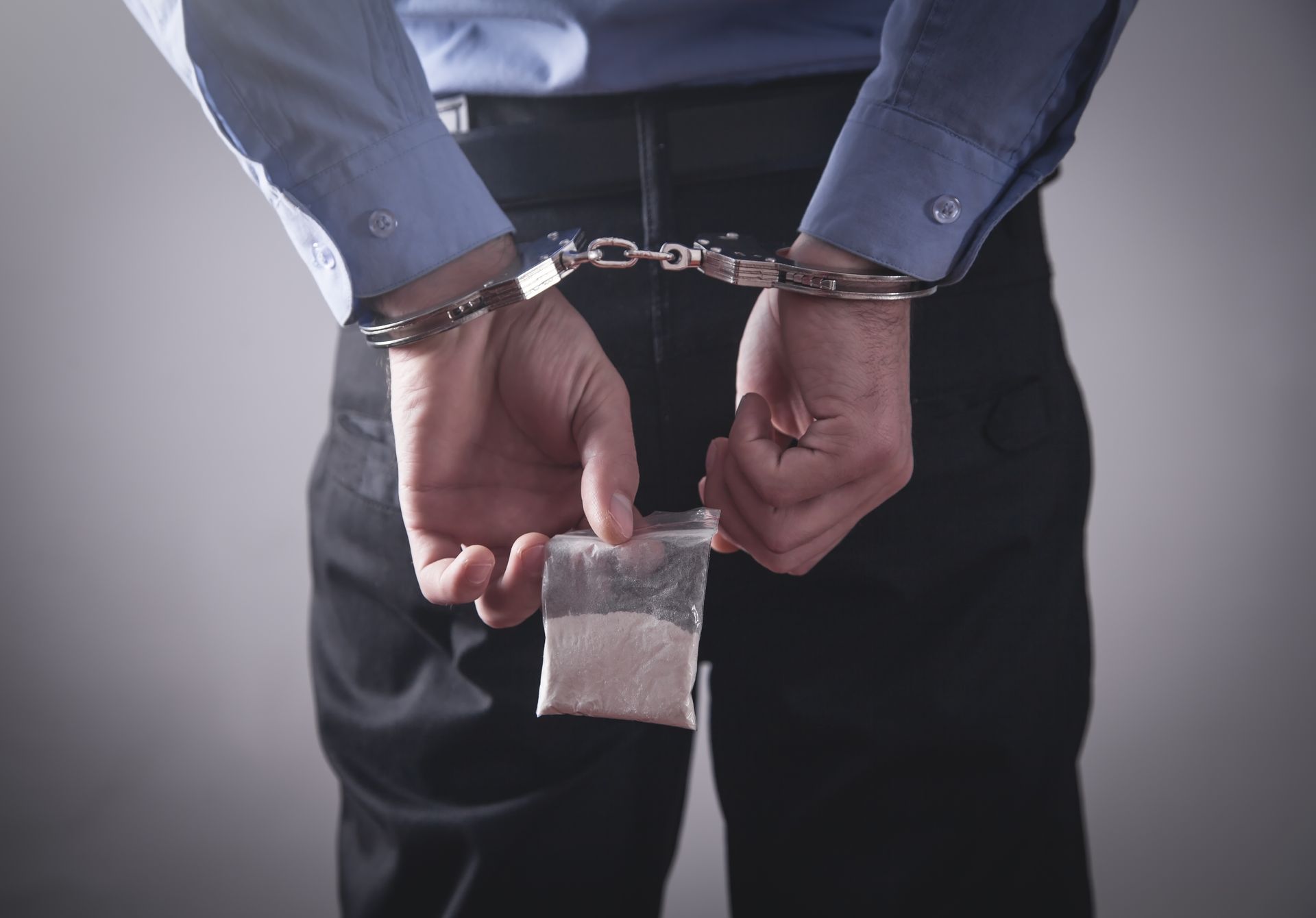 man arrested with drug bag