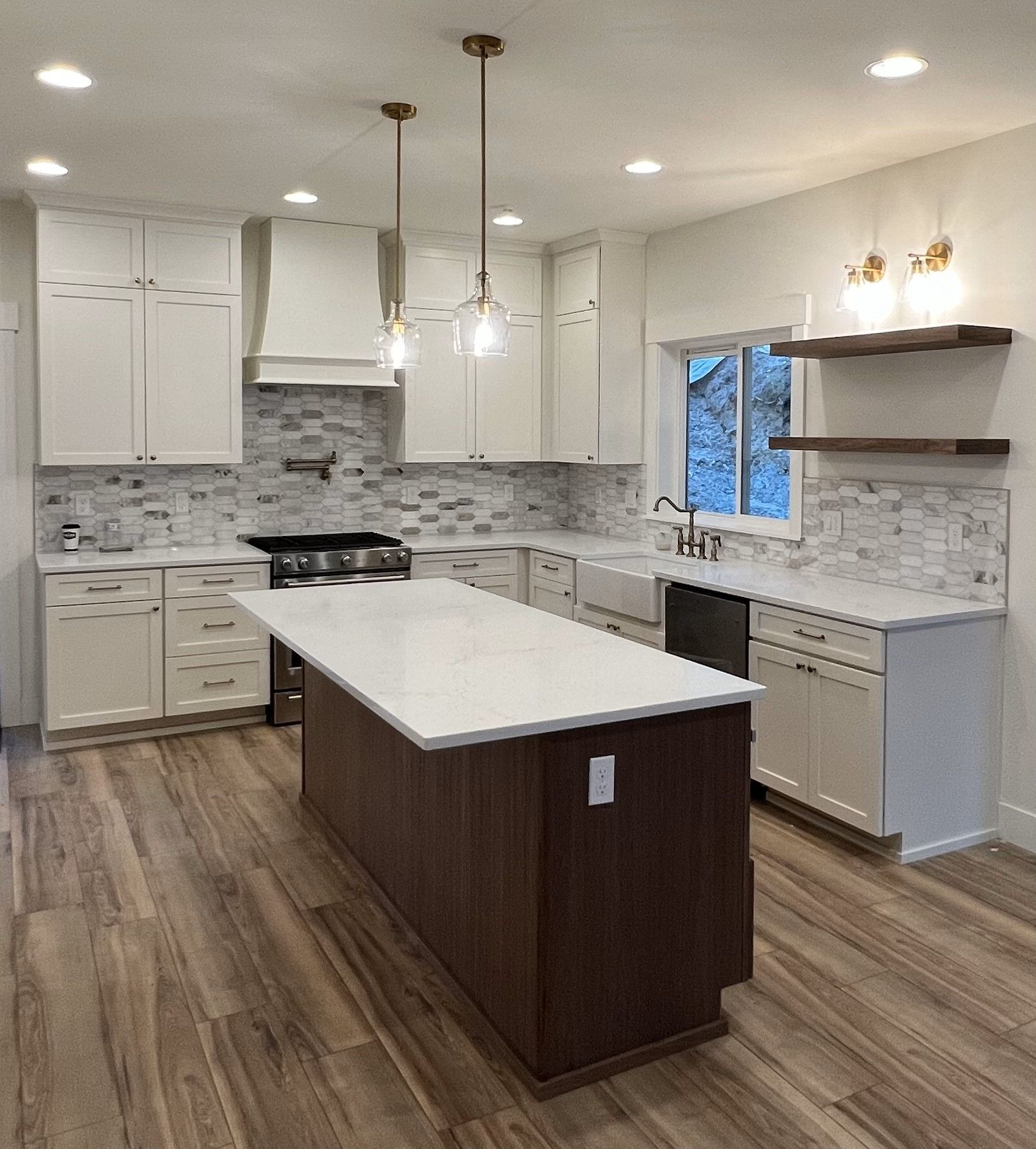 There is a large island in the middle of the kitchen.