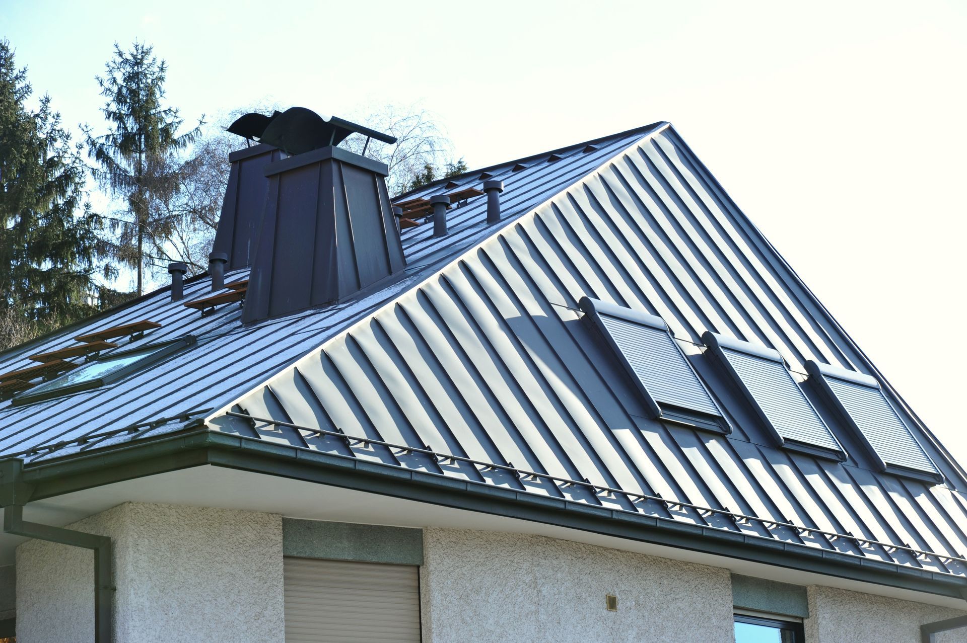 metal roof with chimney and shutters