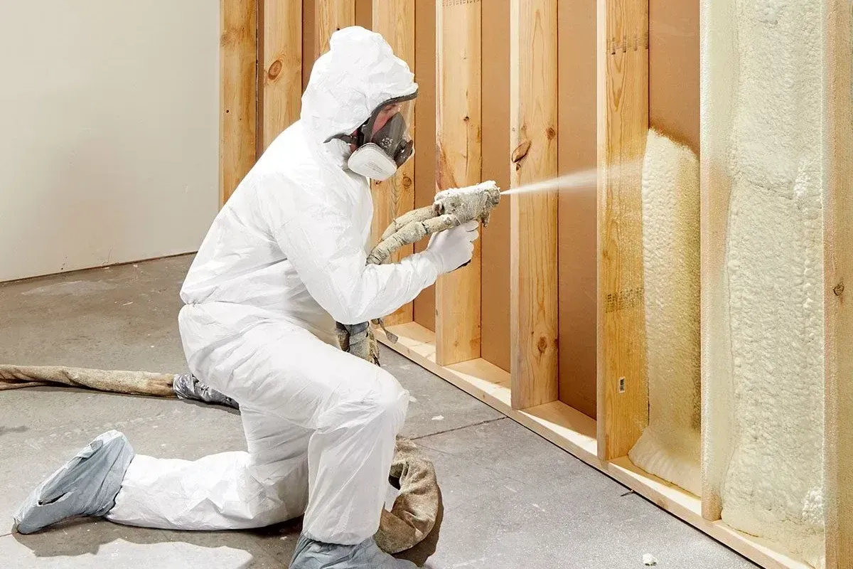 Spray foam insulation process for enhanced energy efficiency