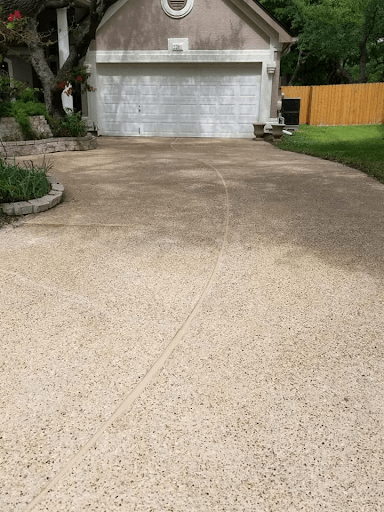 Final product – Driveway Lifted and Levelled, Holes filled and colour matched to existing concrete & Joints sealed to avoid further water intrusion.