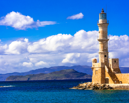 A lighthouse on Crete island in the middle of the ocean - Blog Post Barters Travelnet