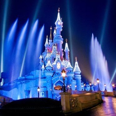Beautiful view of the Disneyland Paris Castle Evening Christmas Show - Barter's Travelnet