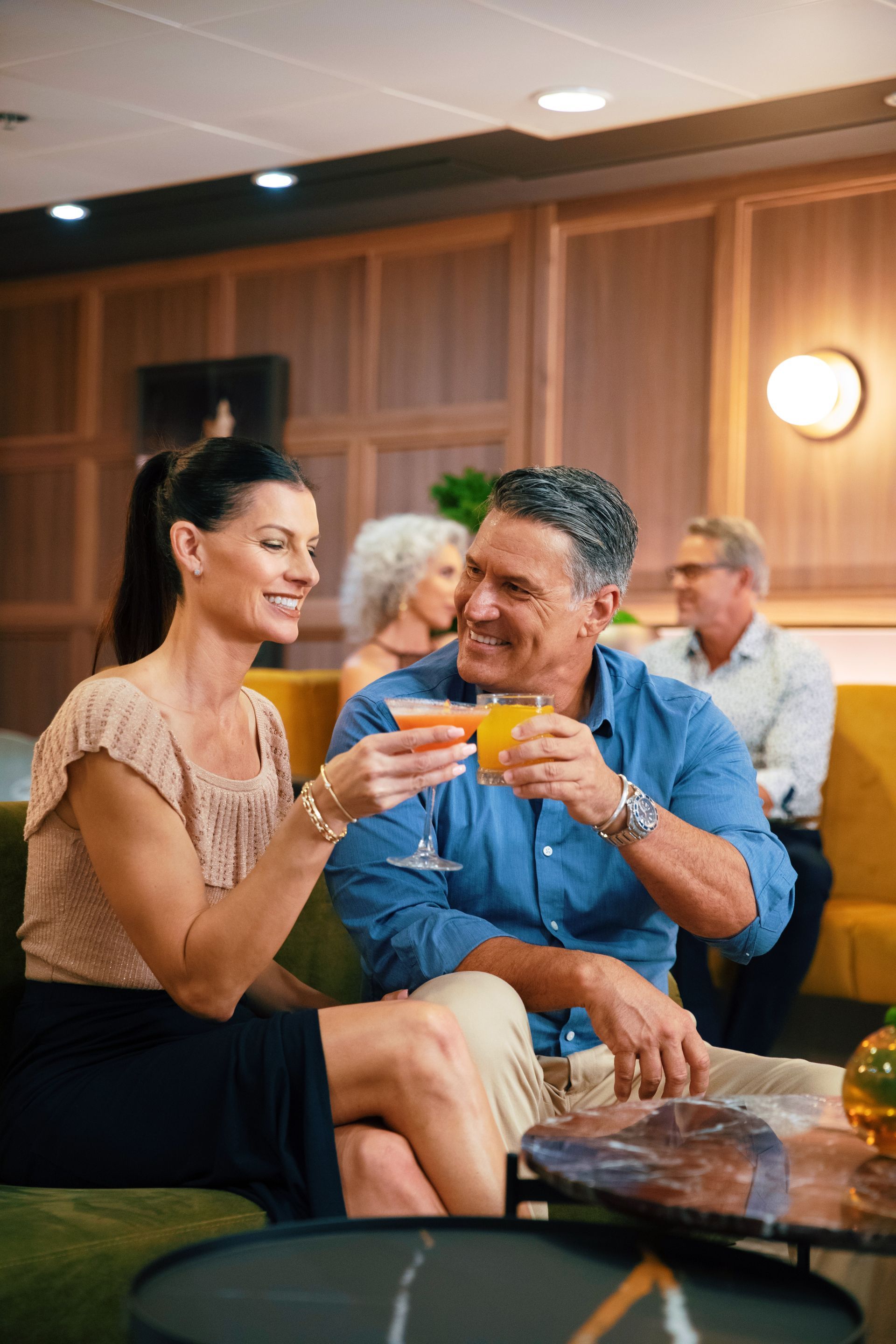 Couple toasting on Atlas Bar - Azamara Cruises Barter's Travlenet