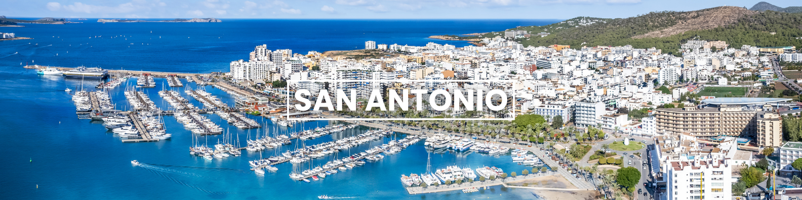 an aerial view of a city surrounded by water and boats . Barter's Travelnet 