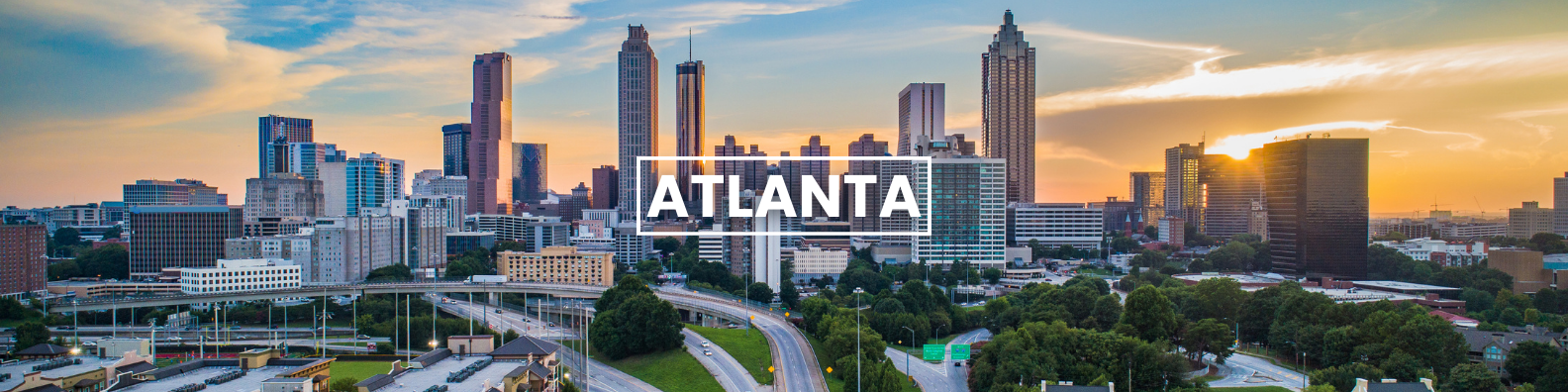an aerial view of the skyline of atlanta at sunset . Barter's Travelnet 