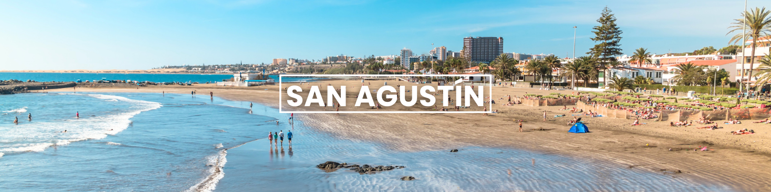 a blurry picture of a beach in san agustin , spain . Barter's Travelnet