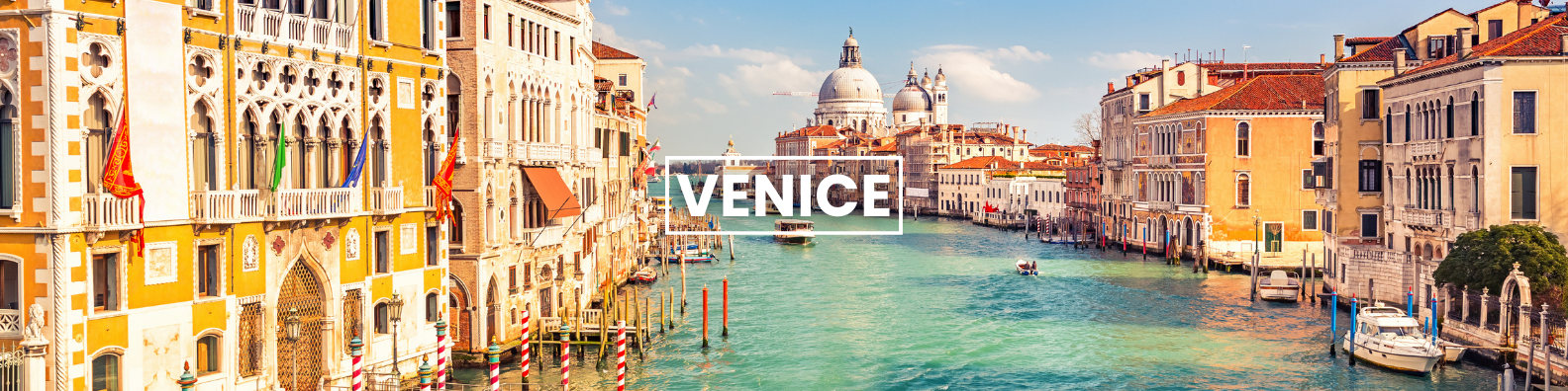 a large body of water surrounded by buildings in venice italy . Barter's Travelnet 