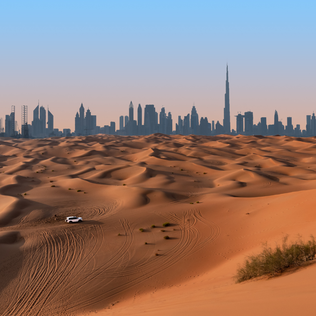 Aerial View of the Dubai Desert, with the City as Background, United Arab Emirates - Dubai Holidays Barter's Travelnet
