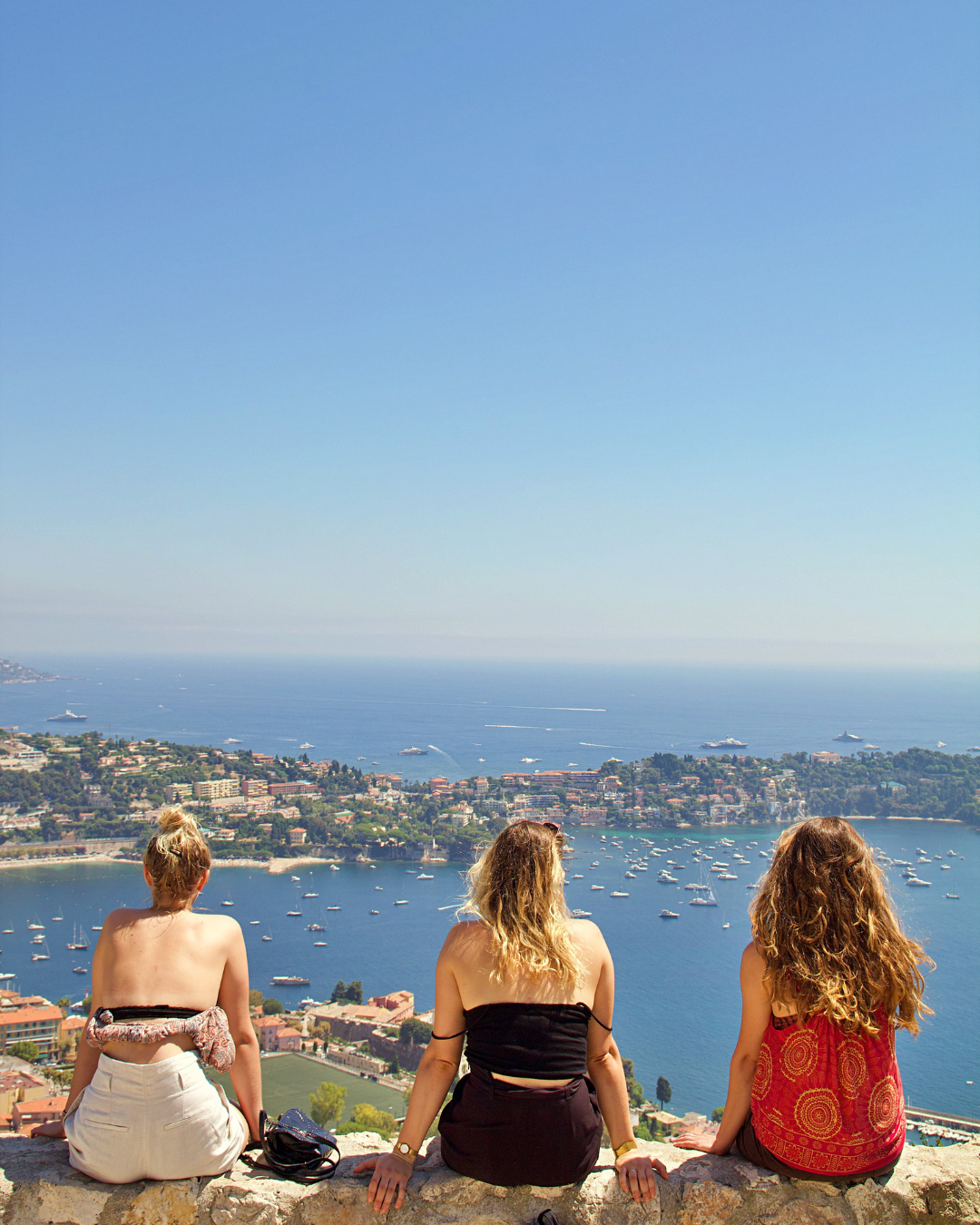 3 Girls sitting Looking to the French Riviera, Côte d'Azur, France - Nice Holidays Barter's Travelnet