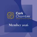 A blue Cork Chamber membership badge for 2026 with a gold circular logo and the text