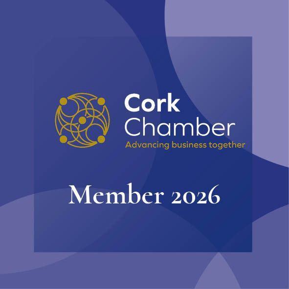 A blue Cork Chamber membership badge for 2026 with a gold circular logo and the text 