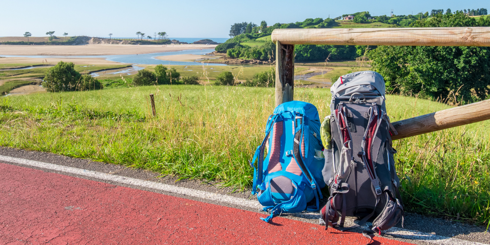 Camino de Santiago Beautiful Image with 2 backpacks - Blog Post Barters Travelnet