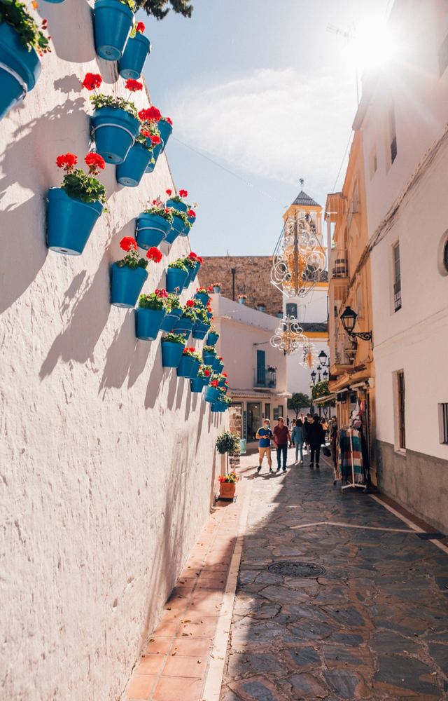 Beautiful narrow street of old town Marbella, Malaga, Spain - Blog Post Barters Travelnet