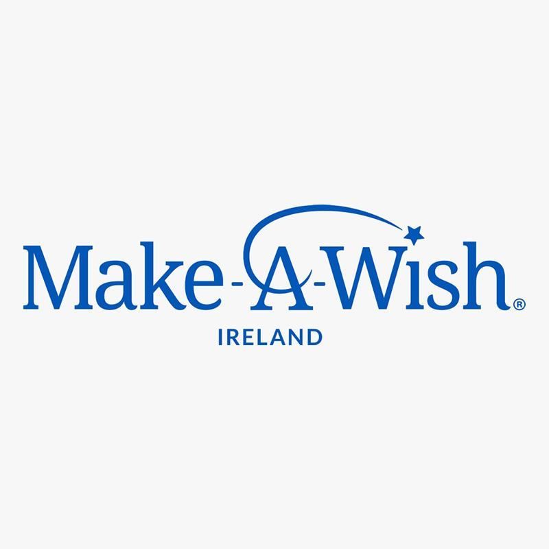the make a wish ireland logo is blue and white on a white background . Barter's Travelnet 