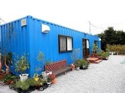 bright blue shipping container home