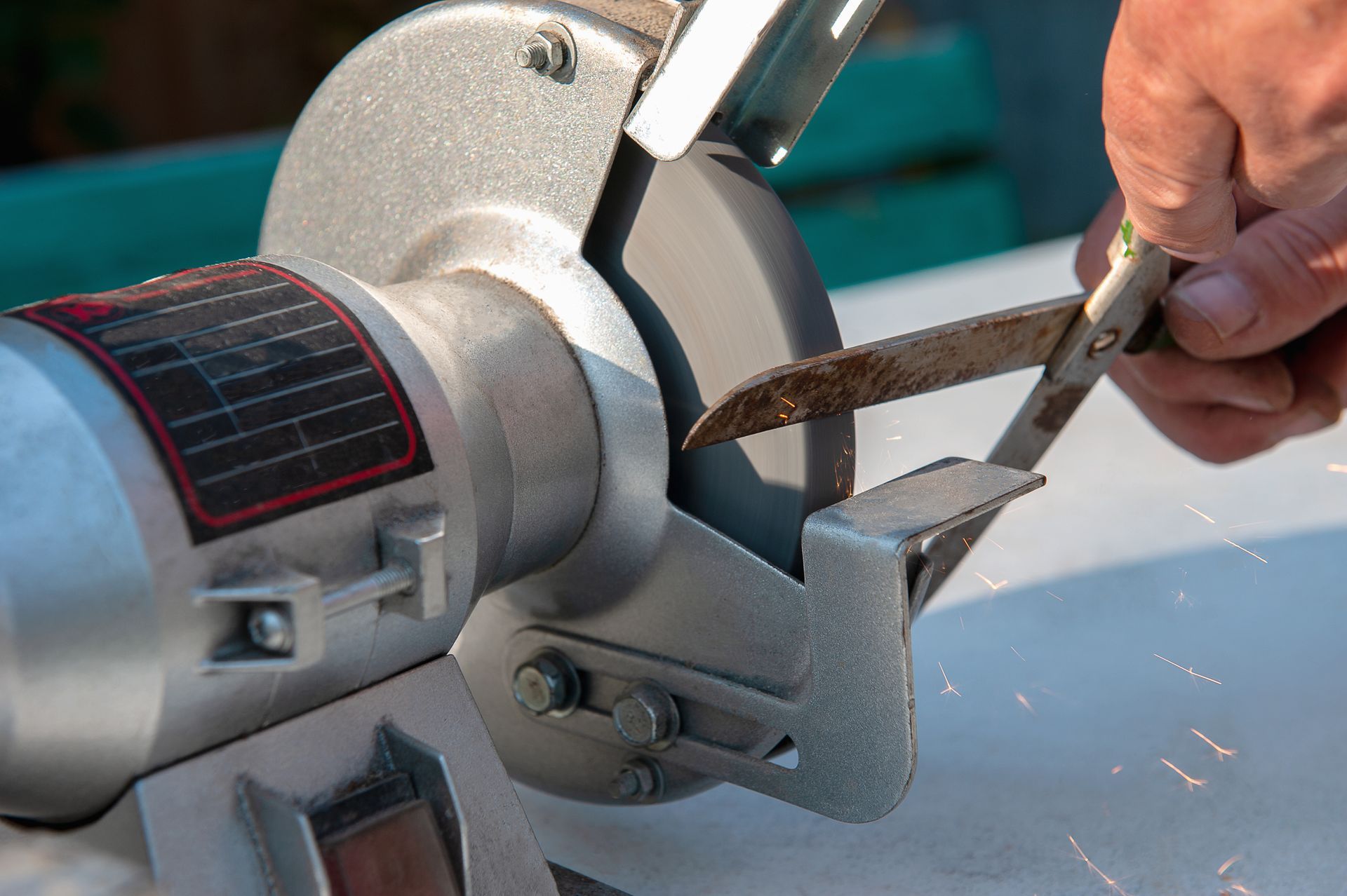 a sharp knife with shaved ice on the background