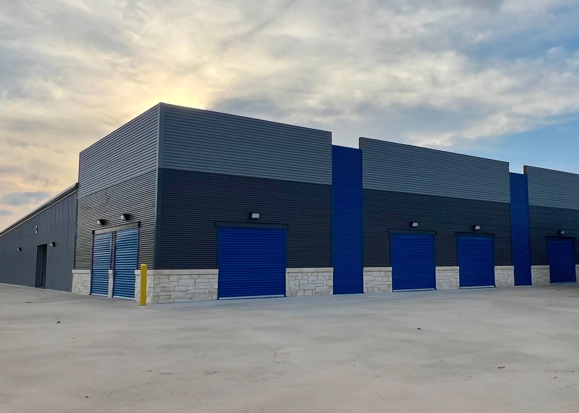 Self storage facility with blue doors offering climate control units and boat and rv parking for New Braunfels, TX