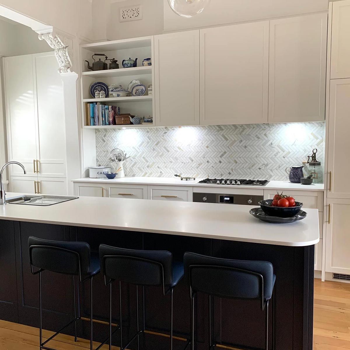 A Kitchen With a Large Island and Stools — Coastal Detail Joinery in Forster, NSW