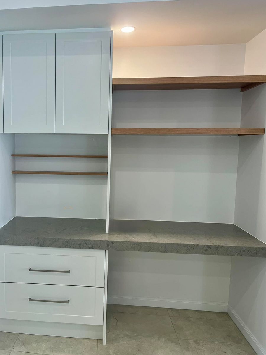 There is a Desk With Drawers and Shelves in the Corner of the Room — Coastal Detail Joinery in Tuncurry, NSW