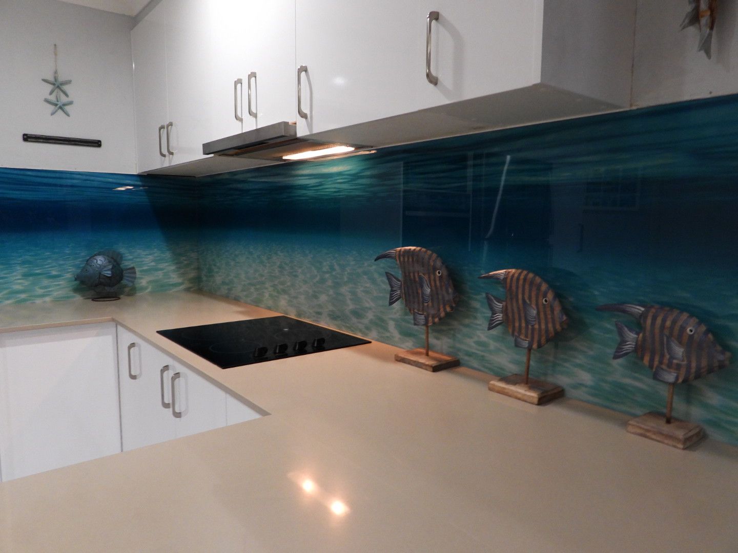 A White Cabinet With Glass Doors and Drawers and a Wine Rack — Coastal Detail Joinery in Taree, NSW