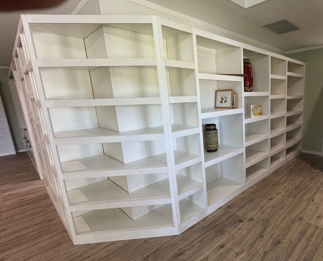 A living room With White Cabinets freshly installed — Coastal Detail Joinery in Tuncurry, NSW