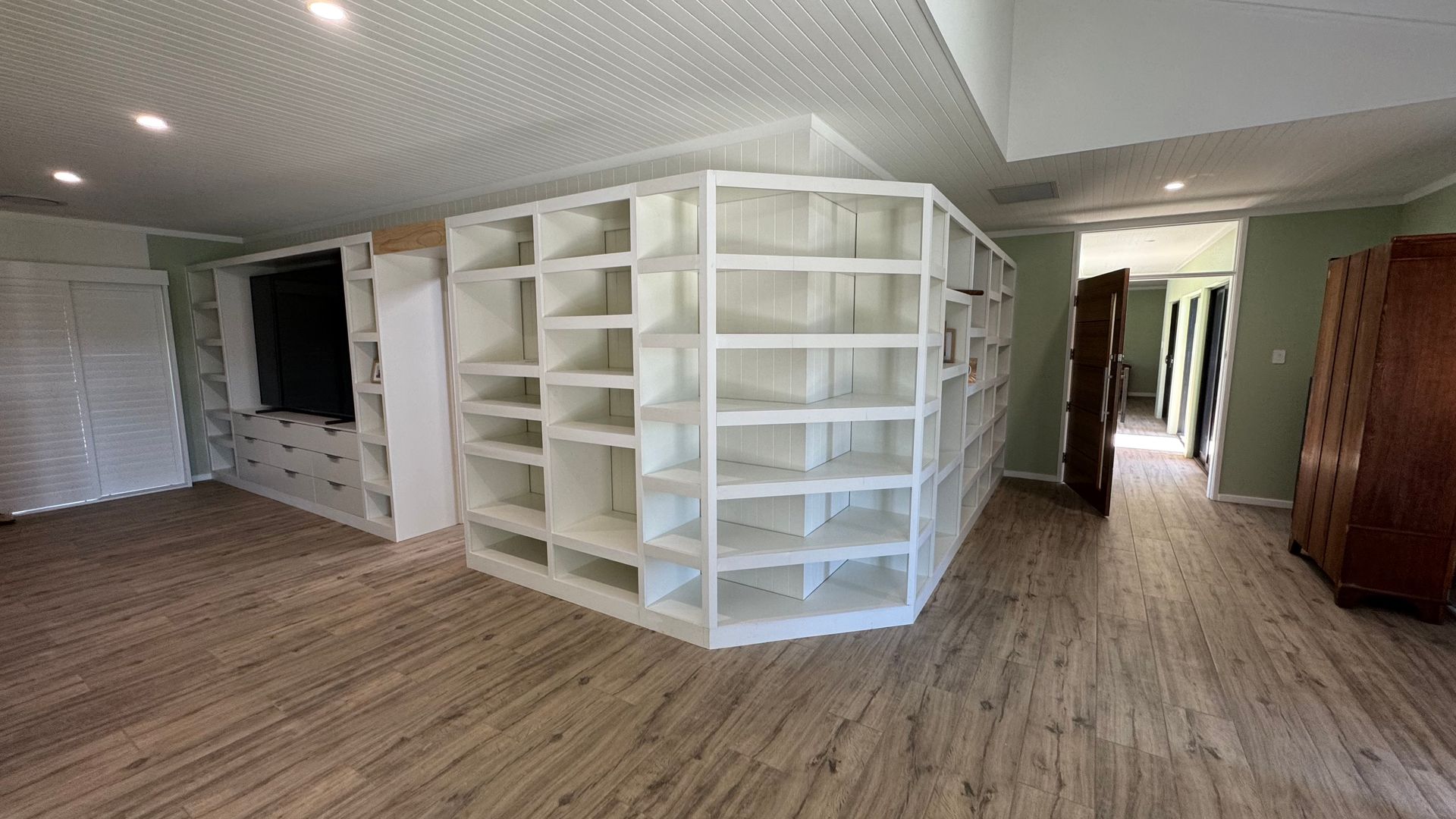 A large room with lots of shelves and a wooden floor — Coastal Detail Joinery in Tuncurry, NSW
