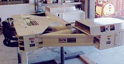 a machine is sitting on top of a table in a room .