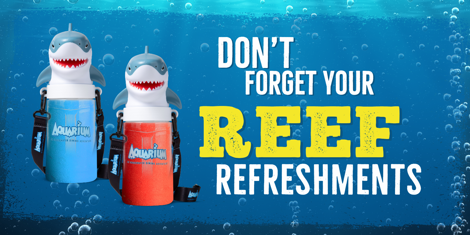 An advertisement for reef refreshments with two sharks on it