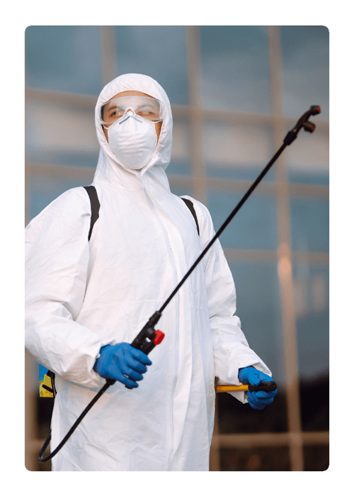 Man in Protective Hazmat Suit with Spray Chemicals — Northern Brisbane, QLD — JHS