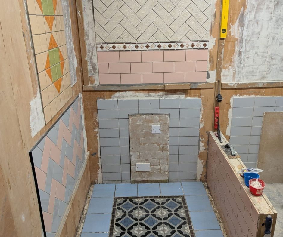 Student applying tiles during hands-on professional tiling training at Chameleon Skills.