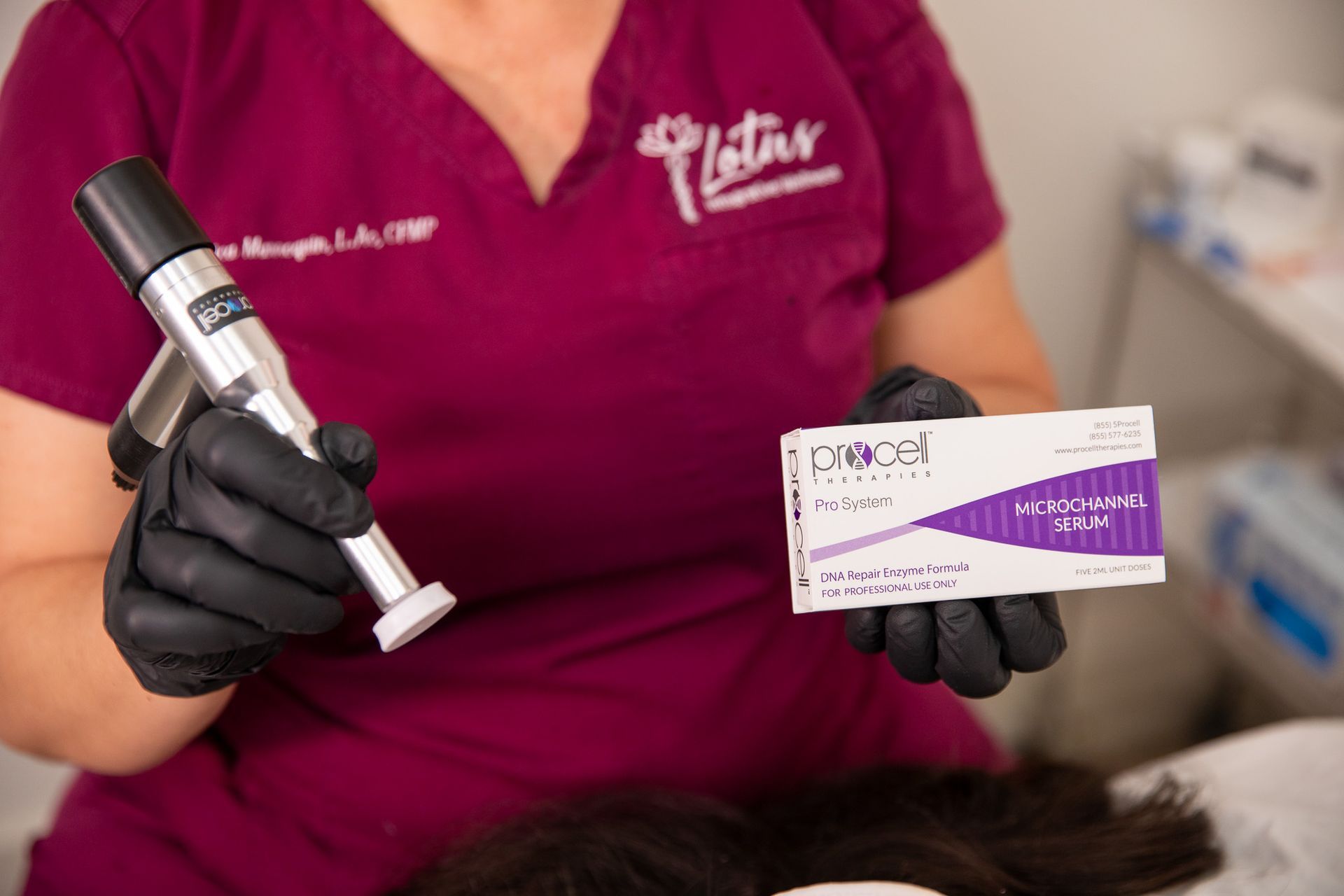 Person in purple scrubs holds a medical device and a box of Crexcel, likely in a medical setting.