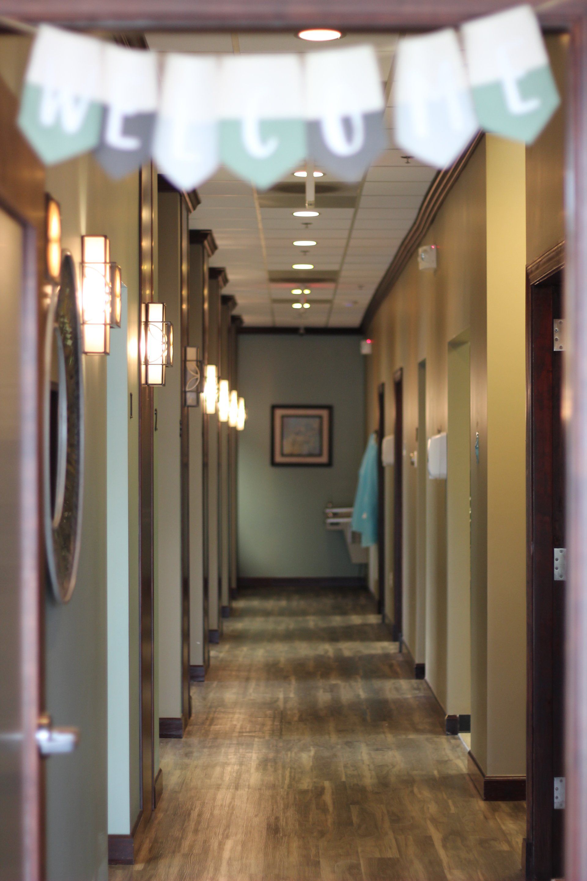 A hallway with a welcome banner hanging from the ceiling
