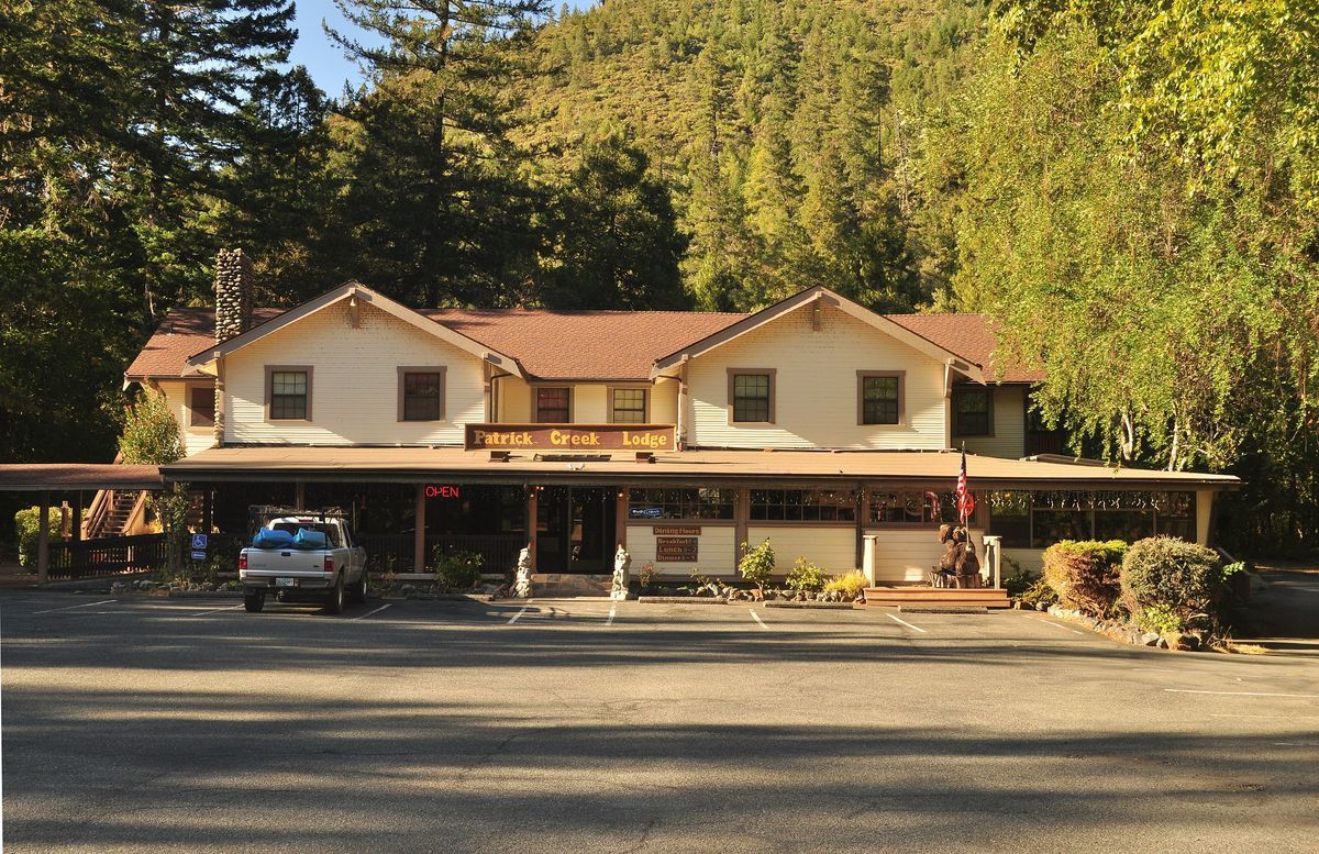 Patrick Creek Historic Lodge exterior surrounded by trees